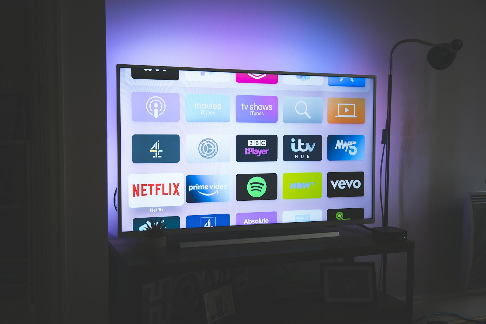 Modern television screen inside a tidy living room